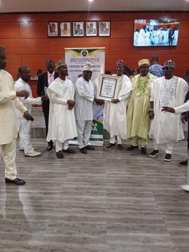 The National Vice Chairman of the Nigerian Neighborhood Watch and Community Service Corps Otunba James Udoma fsin with the former governor of Bauchi State, Gov Baguda at the National Stakeholders Summit on State Police Proposal held in Abuja