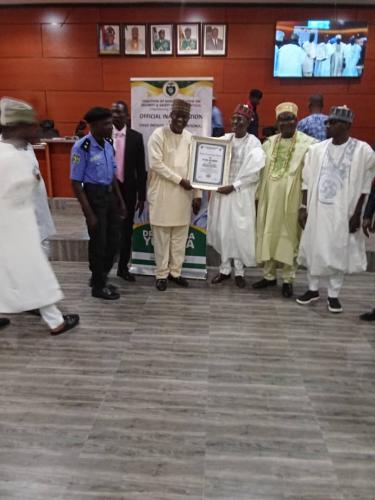 The National Vice Chairman of the Nigerian Neighborhood Watch and Community Service Corps Otunba James Udoma fsin with the former governor of Bauchi State, Gov Baguda at the National Stakeholders Summit on State Police Proposal held in Abuja